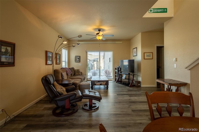 10473 Table Rock Ct Unit E, Poncha Springs, CO 81242 - living area with a ceiling fan, dark wood-style flooring, and baseboards
