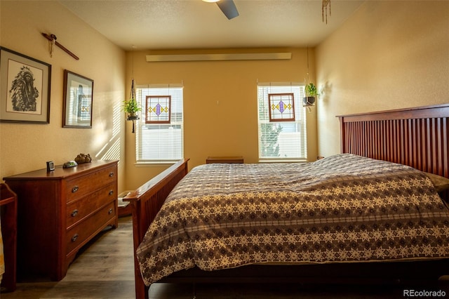 10473 Table Rock Ct Unit E, Poncha Springs, CO 81242 - bedroom with wood finished floors and ceiling fan