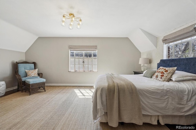 629 Bellaire St, Denver, CO 80220 - bedroom featuring lofted ceiling, a chandelier, and baseboards