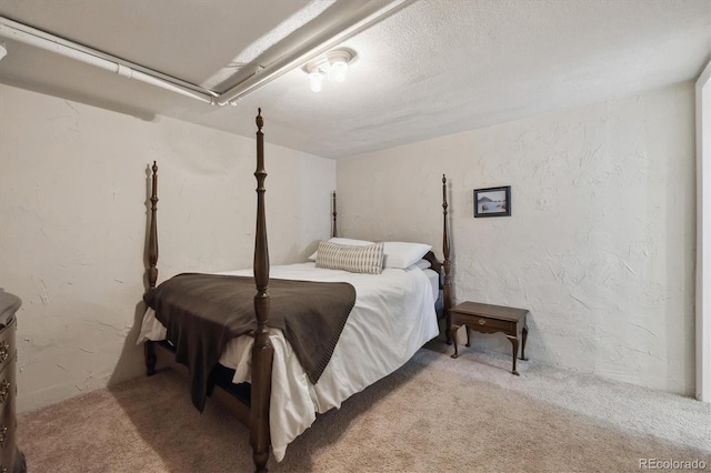 629 Bellaire St, Denver, CO 80220 - bedroom with carpet and a textured wall