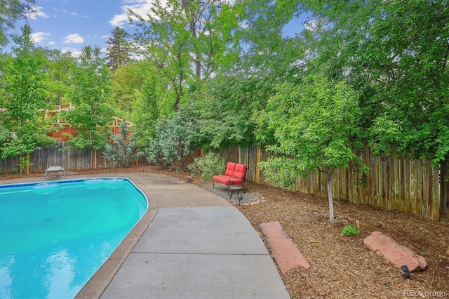 629 Bellaire St, Denver, CO 80220 - view of pool featuring a fenced backyard and a patio area