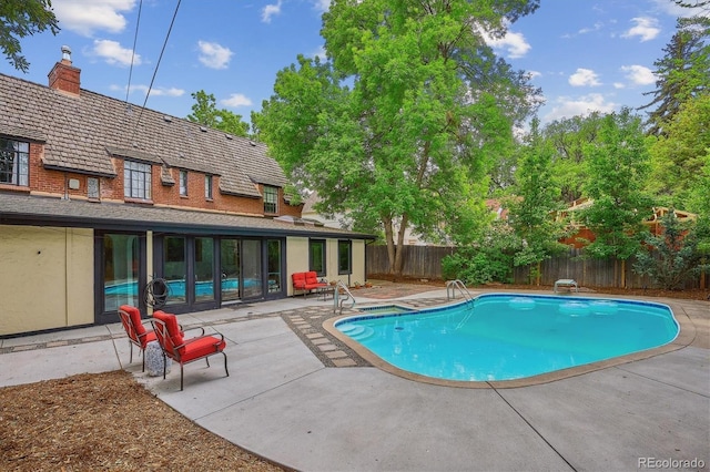 629 Bellaire St, Denver, CO 80220 - view of pool with a patio and a fenced backyard