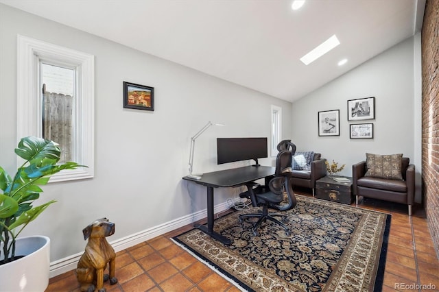 629 Bellaire St, Denver, CO 80220 - office space with vaulted ceiling, a skylight, and recessed lighting
