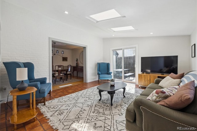 629 Bellaire St, Denver, CO 80220 - living room with a skylight, vaulted ceiling, and recessed lighting