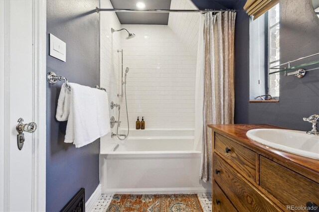 629 Bellaire St, Denver, CO 80220 - full bathroom with shower / bathtub combination with curtain and vanity