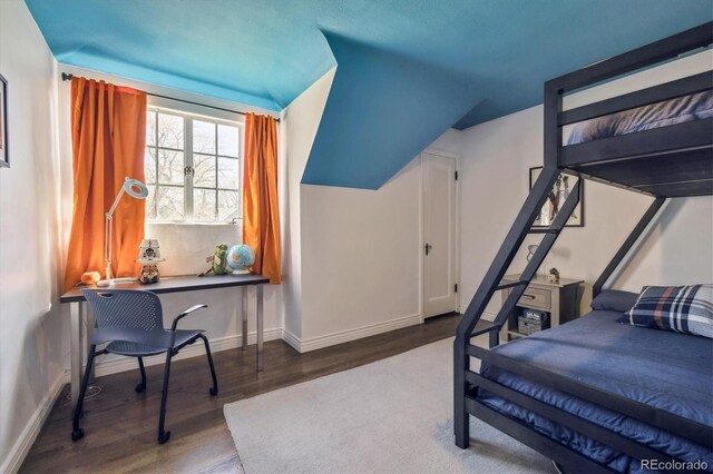 629 Bellaire St, Denver, CO 80220 - bedroom featuring wood finished floors and baseboards