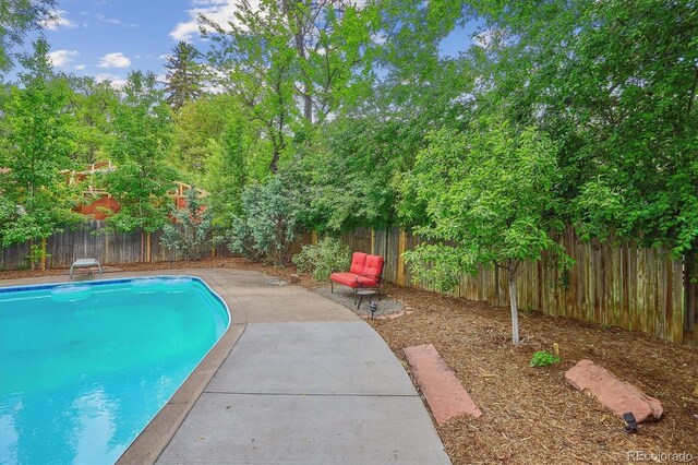 629 Bellaire St, Denver, CO 80220 - view of swimming pool with a fenced backyard and a patio area