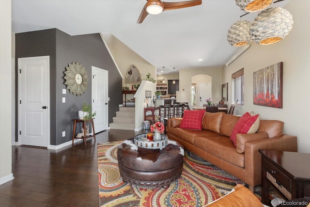 10497 Table Rock Ct, Poncha Springs, CO 81242 - living area featuring hardwood / wood-style floors, ceiling fan, arched walkways, stairway, and recessed lighting