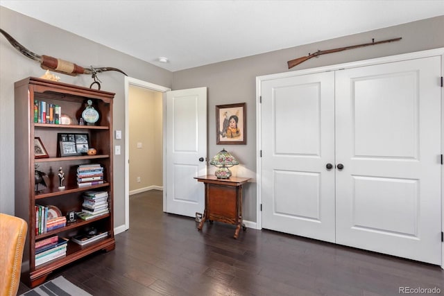 10497 Table Rock Ct, Poncha Springs, CO 81242 - sitting room with baseboards and dark wood-style floors