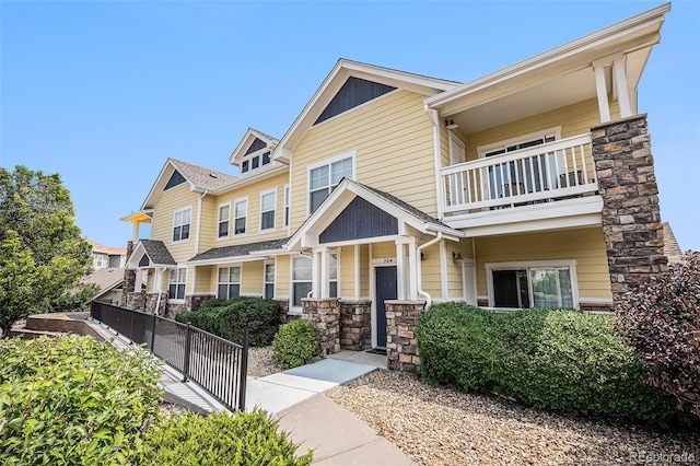 9434 Ashbury Cir Unit 204, Parker, CO 80134 - view of front of property with a balcony and stone siding