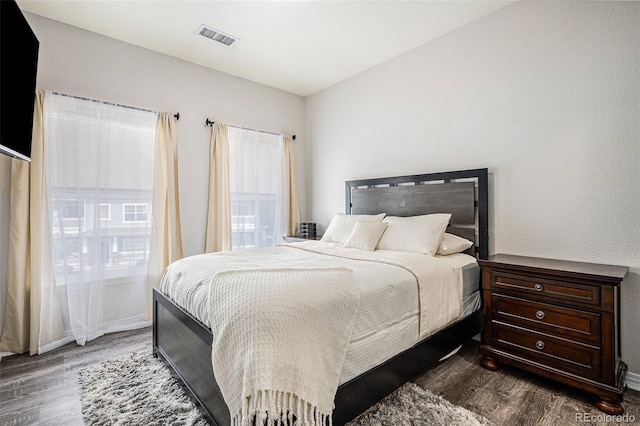 9434 Ashbury Cir Unit 204, Parker, CO 80134 - bedroom featuring wood finished floors and baseboards