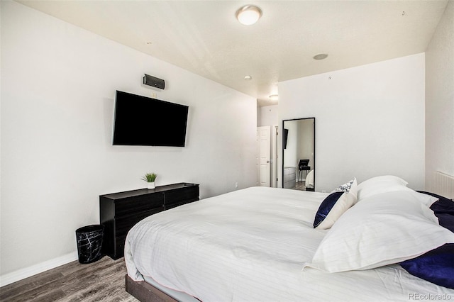 9434 Ashbury Cir Unit 204, Parker, CO 80134 - bedroom with wood finished floors and baseboards
