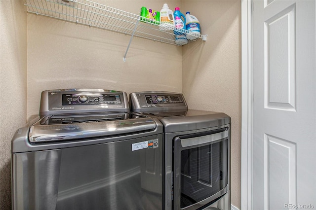 9434 Ashbury Cir Unit 204, Parker, CO 80134 - laundry area featuring washing machine and clothes dryer