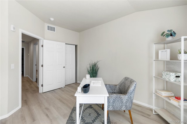 875 E 78th Ave Unit 21, Denver, CO 80229 - home office with vaulted ceiling, light wood-type flooring, and baseboards