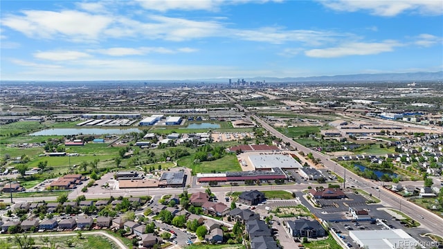 875 E 78th Ave Unit 21, Denver, CO 80229 - aerial view of property and surrounding area featuring a nearby body of water