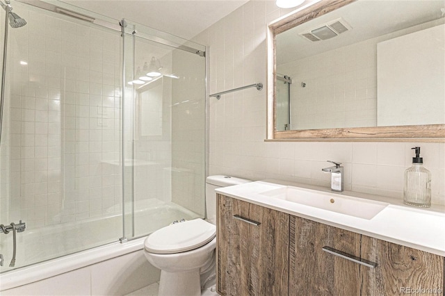 full bath featuring visible vents, toilet, tile walls, enclosed tub / shower combo, and backsplash
