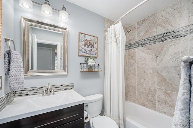 full bathroom featuring decorative backsplash, toilet, vanity, and shower / tub combo with curtain