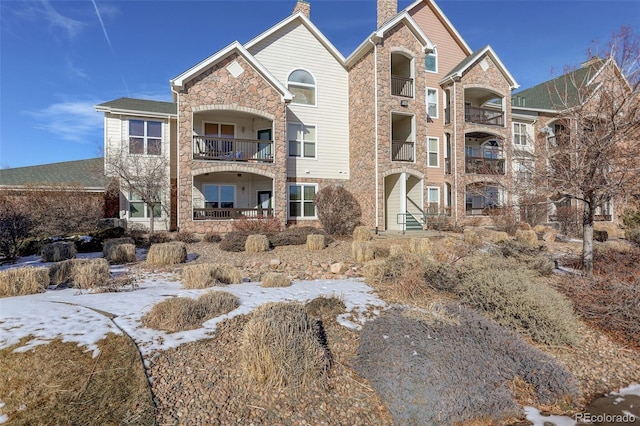 view of snow covered property