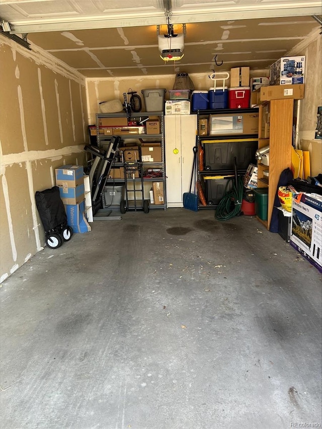 19049 E Warren Dr Unit 105, Aurora, CO 80013 - garage featuring a garage door opener