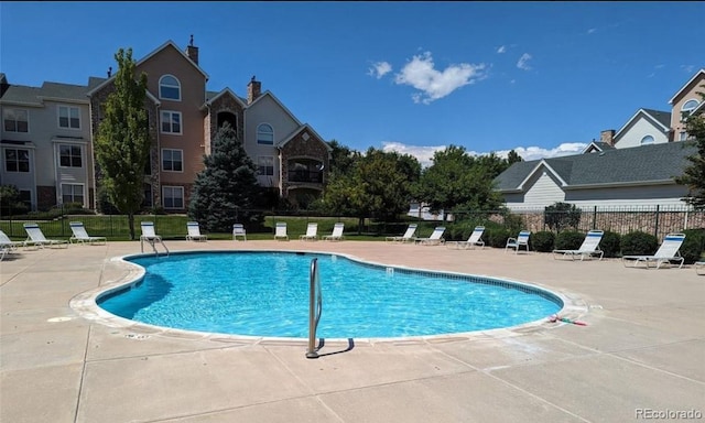 19049 E Warren Dr Unit 105, Aurora, CO 80013 - community pool featuring a patio area