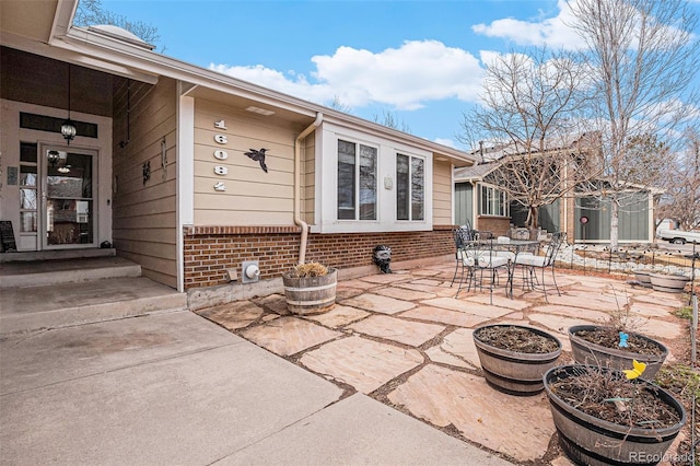 view of patio with outdoor dining area