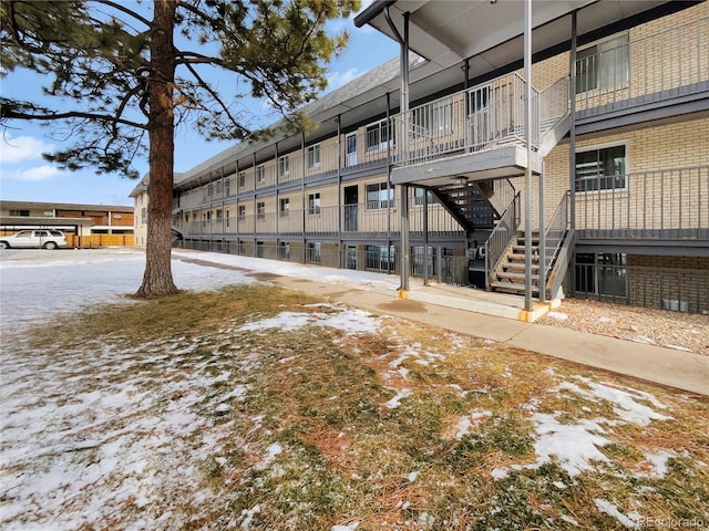 view of snow covered property