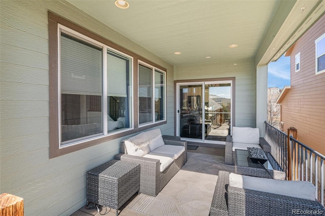 view of patio with a balcony and an outdoor hangout area