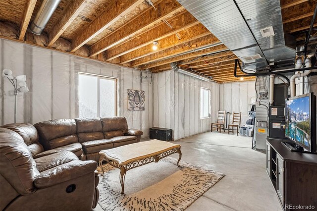 living area with concrete floors