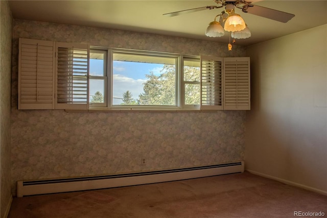 962 S Beech St, Lakewood, CO 80228 - carpeted empty room featuring baseboard heating, ceiling fan, and baseboards