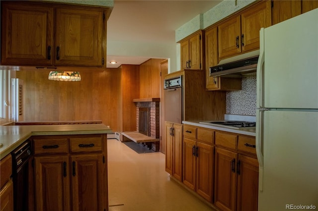 962 S Beech St, Lakewood, CO 80228 - kitchen featuring freestanding refrigerator, oven, brown cabinetry, light countertops, and under cabinet range hood