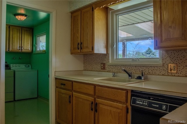 962 S Beech St, Lakewood, CO 80228 - kitchen with separate washer and dryer, dishwasher, light countertops, and a sink