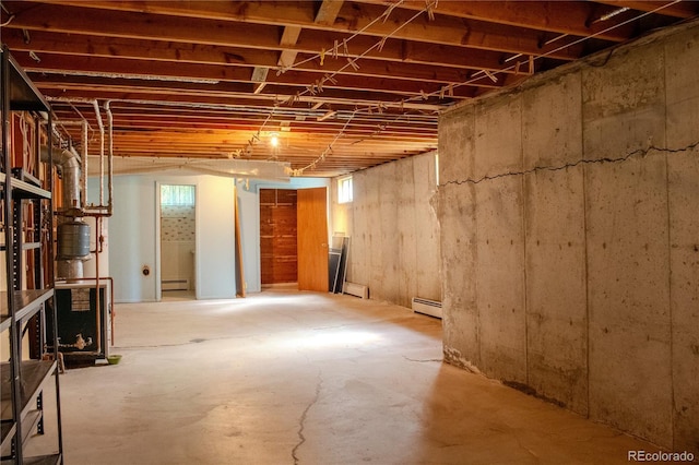 962 S Beech St, Lakewood, CO 80228 - unfinished basement with a baseboard radiator and a baseboard heating unit