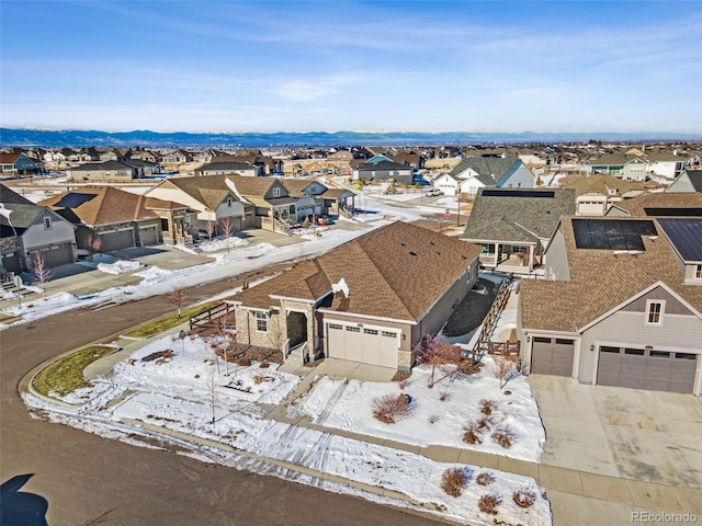 aerial view featuring a mountain view and a residential view