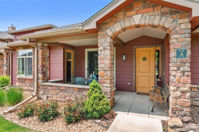 8595 Gold Peak Dr Unit A, Highlands Ranch, CO 80130 - view of exterior entry featuring stone siding