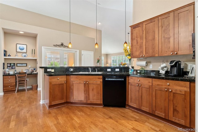 8595 Gold Peak Dr Unit A, Highlands Ranch, CO 80130 - kitchen with black dishwasher, a sink, a peninsula, brown cabinets, and a high ceiling