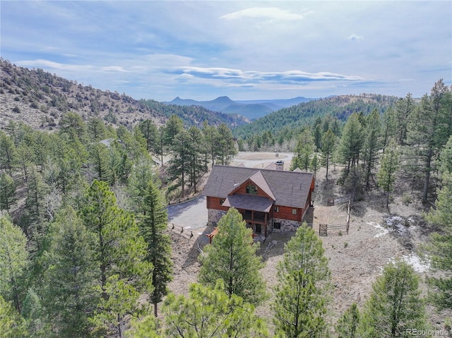 14753 Kit Carson Peak Trl, Pine, CO 80470 - view of mountain backdrop with a heavily wooded area