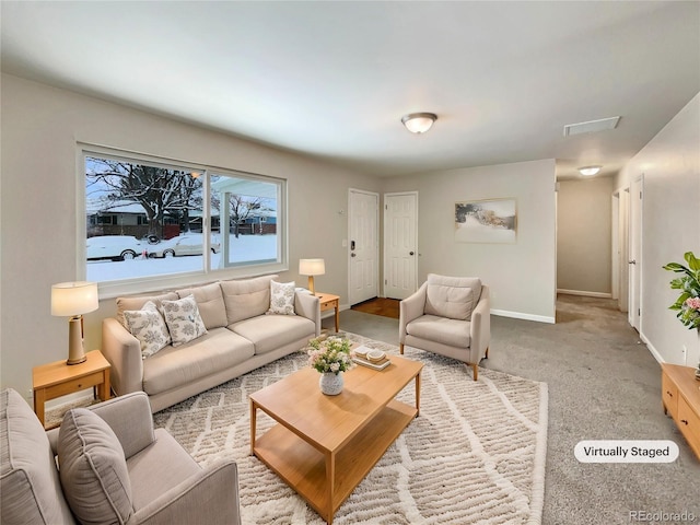 living room featuring light colored carpet