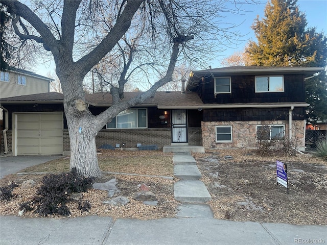 split level home with a garage