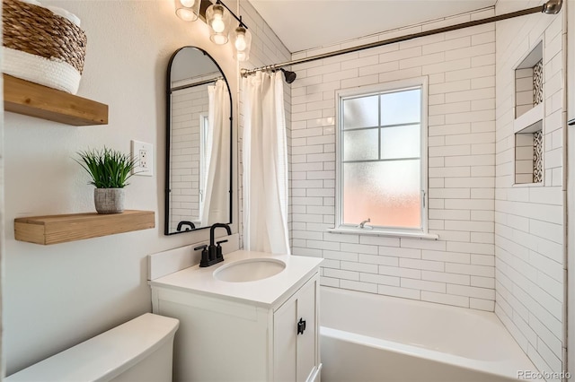 full bathroom with vanity, toilet, and shower / bathtub combination with curtain