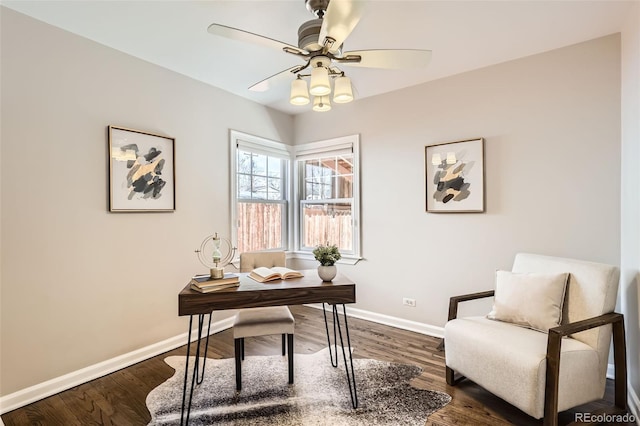 office space with a ceiling fan, baseboards, and dark wood-style flooring