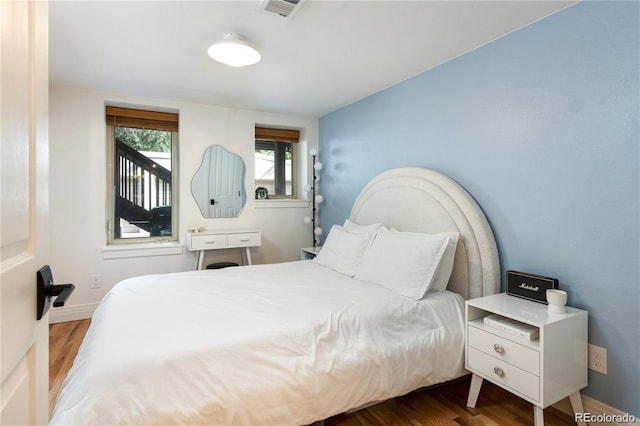 bedroom featuring hardwood / wood-style floors