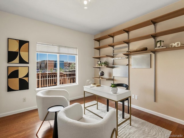 12335 E 2nd Dr, Aurora, CO 80011 - home office featuring baseboards and wood finished floors