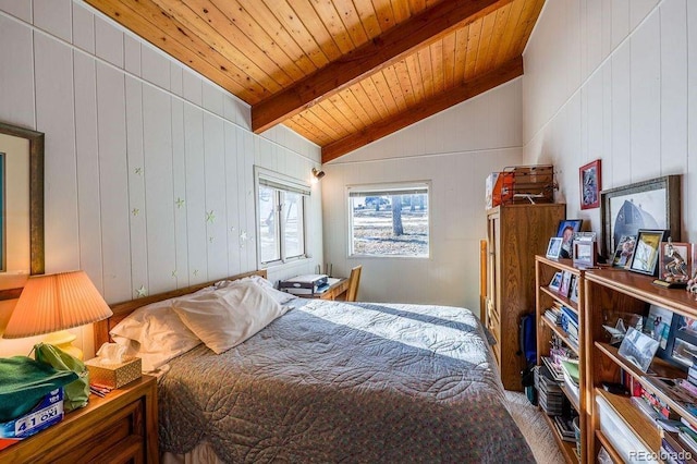 bedroom with vaulted ceiling with beams, wooden walls, and wood ceiling