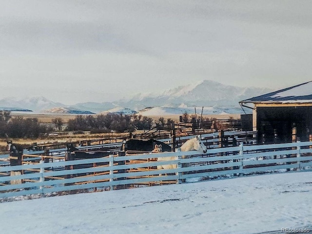 exterior space featuring a mountain view and a rural view