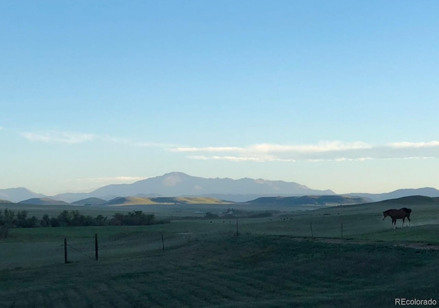 property view of mountains with a rural view