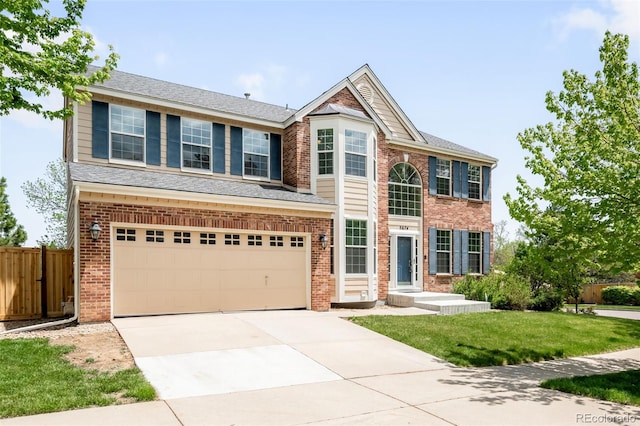 view of front of home featuring driveway, an attached garage, and brick siding