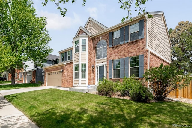 view of front facade with brick siding and concrete driveway