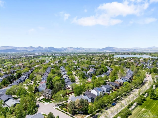 aerial view of residential area with a water and mountain view
