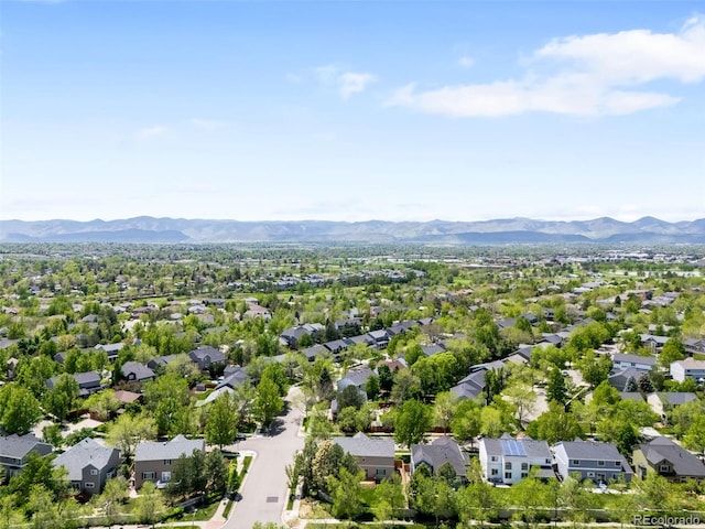 aerial perspective of suburban area featuring a mountain backdrop