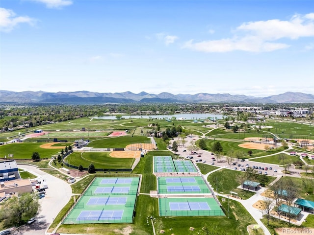 aerial view of property's location with a water and mountain view